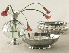 Silver bowls and vases